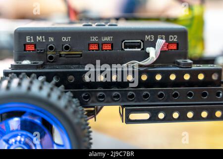 programmable children's robot car in the form of a platform on wheels Stock Photo