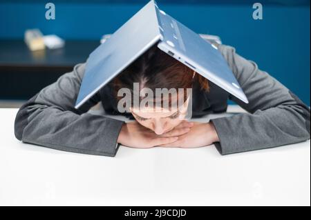 Hiding under desk hi-res stock photography and images - Alamy