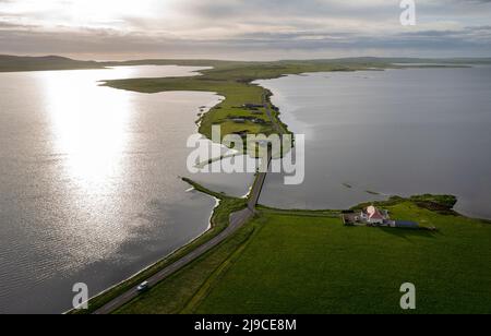 Aerial view of the Ness of Brodgar archaeological site located between  Loch Stenness (left) and Loch Harray, West Mainland, Orkney Islands, Scotland. Stock Photo