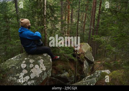 Young sportsman looking at scenery landscape during journey Stock Photo
