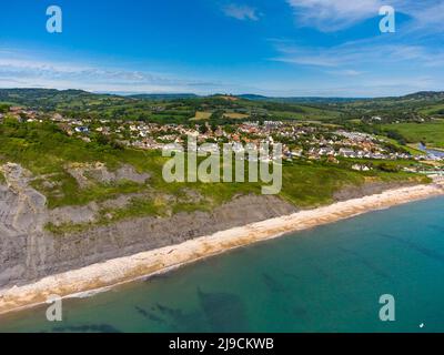 Charmouth, Dorset, UK.  22nd May 2022.  UK Weather.  View from the air of the Black Venn cliffs at Charmouth on the Jurassic Coast of Dorset on an afternoon of scorching hot sunshine. Picture Credit: Graham Hunt/Alamy Live News Stock Photo