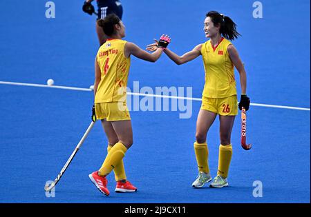 Stratford, United Kingdom. 22nd May, 2022. England V China Womens FIH Pro League. Lee Valley Hockey centre. Stratford. Yang Chen (China, 26) is congratulated by Ying Zhang (China, 6) after she scores the 3rd China goal during the England V China Womens FIH Pro League hockey match. Credit: Sport In Pictures/Alamy Live News Stock Photo