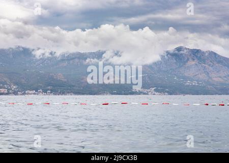 Budva, Montenegro - August 26, 2021: View of Budva town, Luxury travel destination with beatuiful beaches at Adriatic sea with amazing mountainscape c Stock Photo