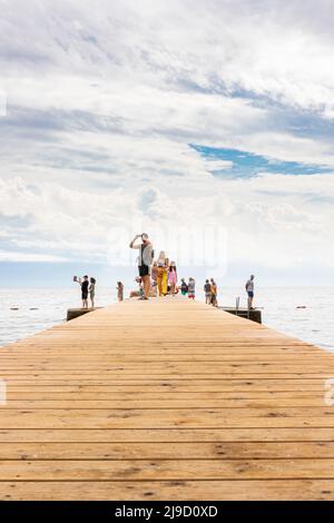 Budva, Montenegro - August 26, 2021: People at wooden pear in the old town of Budva , Montenegro Stock Photo