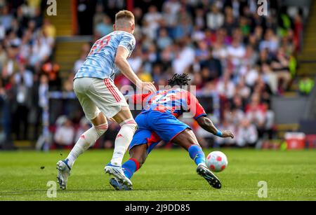 London, UK. 22nd May, 2022. a39 and Jeffrey Schlupp of Crystal Palace FC come together during the Premier League match between Crystal Palace and Manchester United at Selhurst Park, London, England on 22 May 2022. Photo by Phil Hutchinson. Editorial use only, license required for commercial use. No use in betting, games or a single club/league/player publications. Credit: UK Sports Pics Ltd/Alamy Live News Stock Photo