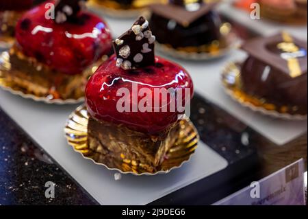 Austrian desserts, different types of chocolate and fruit cakes on display in cafe in Vienna. Stock Photo