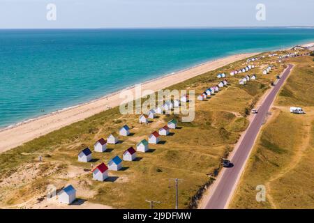 Colourful beach huts, wooden beach cabins in Gouville-sur-Mer, Normandy, France. Stock Photo