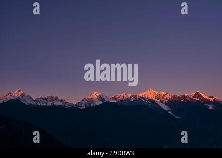 kawabego peak of the meili snow mountain at sunrise in yunnan province, china Stock Photo