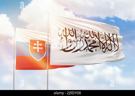 Sunny blue sky and flags of afghanistan and slovakia Stock Photo