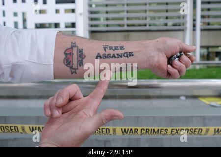 A Julian Assange supporter's tattoo. A decision whether to extradite Julian Assange to the US will be made by Home Secretary Priti Patel imminently. Stock Photo