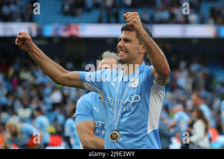 Manchester, UK. 23rd May, 2022. Rodri of Manchester City celebrates winning the Premier League after beating Aston Villa during their English Premier League match in Manchester, Britain, May 22, 2022. Credit: Xinhua/Alamy Live News Stock Photo