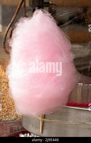 Pink cotton candy sweet sold on local market fair Stock Photo