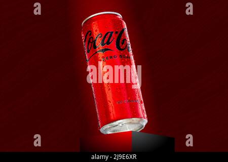 330ml can of Coca-Cola zero with water droplets on red background. Coca-Cola Classic. Estonia, Tallinn, May, 2022 Stock Photo