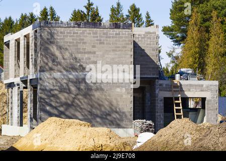 Single Family Home Construction. Interior frame of new wooden house under construction. Stock Photo