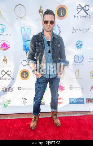 Malibu, California, USA. 21st May, 2022. Jarrid Masse attends The Launch of the Justice ForOM Summit series and Ecovvear Fashion Show at Marwah Estate, Malibu, CA on May 21, 2022 Credit: Eugene Powers/Alamy Live News Stock Photo