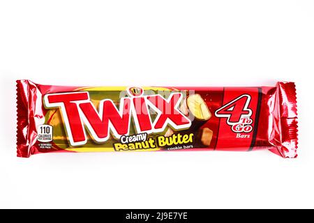 Twix cookies coated with milk chocolate isolated on a white background. Stock Photo