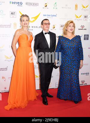 Cannes, France. 22nd May, 2022. Cannes, France. 22nd May, 2022. H.E. Dominique Ouattara (First Lady of Côte d’Ivoire), Sharon Stone, Manuel Collas De La Roche (Better world Fund’s president) attends the gala night of “Better world Fund” during which an auction sale chaired by Sharon Stone, to benefit of Virtuosa Foundation to develop a project for Ukrainian refugees in Poland. Marriot Hotel, on May 22, 2022 in Cannes, France. Photo by Marco Piovanotto/ABACAPRESS.COM Credit: Abaca Press/Alamy Live News Stock Photo