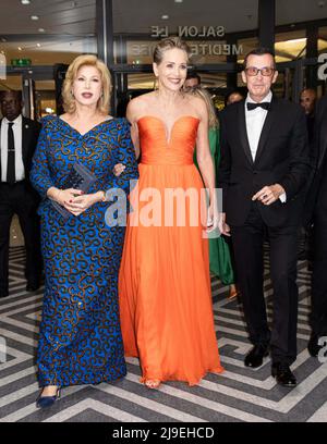 Cannes, France. 22nd May, 2022. H.E. Dominique Ouattara (First Lady of Côte d’Ivoire), Sharon Stone, Manuel Collas De La Roche (Better world Fund’s president) attends the gala night of “Better world Fund” during which an auction sale chaired by Sharon Stone, to benefit of Virtuosa Foundation to develop a project for Ukrainian refugees in Poland. Marriot Hotel, on May 22, 2022 in Cannes, France. Photo by Marco Piovanotto/ABACAPRESS.COM Credit: Abaca Press/Alamy Live News Stock Photo