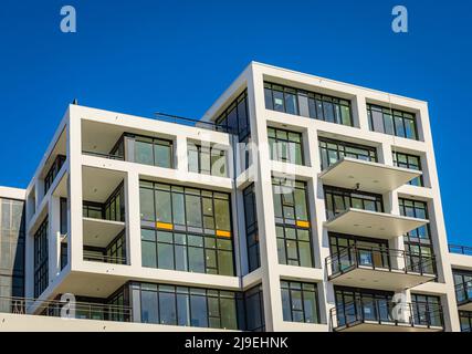 Facade detail of a modern high-rise apartment building. Abstract Architectural Detail of a High Rise Condo Building. Street photo, nobody, selective f Stock Photo