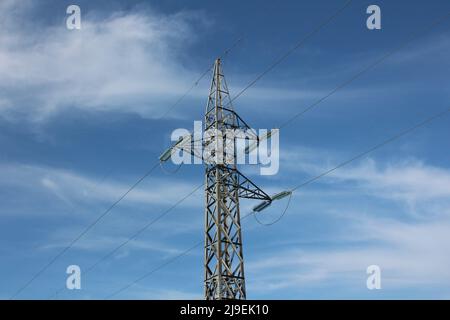 High voltage electric pylon on the sky background Stock Photo