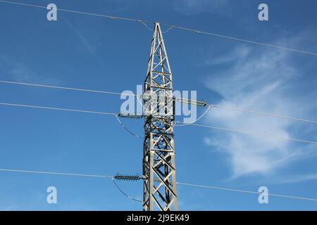 High voltage electric pylon on the sky background Stock Photo