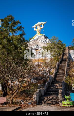 Aerial view of Wat Khao Samo Khon temple, with hanuman monkey god statue on top of mountain, in Lopburi, Thailand Stock Photo