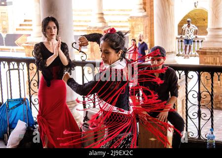 Seville, Spain - May 21, 2022 Flamenco dancers performing in the streets of Seville during the coronavirus outbreak hitting Spain Stock Photo