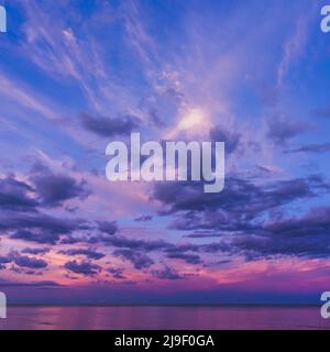 Colorful sky after the sunset on the beach Stock Photo