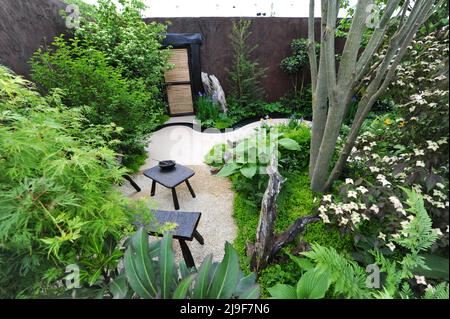 London, UK. 23rd May, 2022. The Boodles Travel Garden, one of the beautiful Sanctuary Gardens on display at the 2022 Royal Horticultural Society Chelsea Flower Show which opened today in the grounds of the Royal Hospital Chelsea in Chelsea, London, United Kingdom - 23 May 2022.  Harnessing the positive power of nature to nurture and heal, Sanctuary Gardens embrace different design styles and illustrate concepts that embrace our lifestyles and challenge our thinking.  In 1962, 60 years ago, Anthony Wainwright, grandfather of the current chairman of Boodles, travelled around the world in just 16 Stock Photo