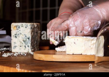 Cheese shop. Roquefort. Selective focus. Close up. Stock Photo