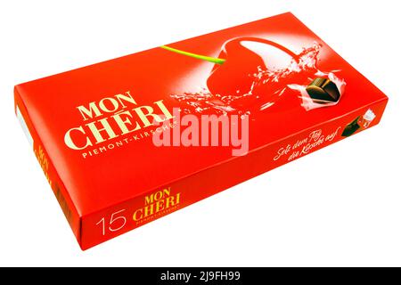 Hamburg, Germany -  May  20  2022:  Ferrero  Mon Cheri chocolates and package isolated on white background Stock Photo