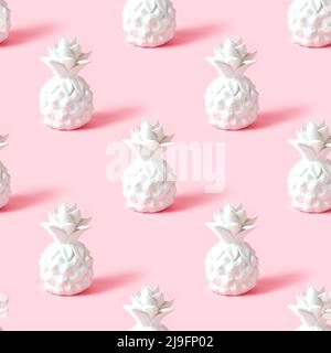 White pineapple tropical fruit repeat seamless pattern on light pastel pink background for wrapping paper. Stock Photo