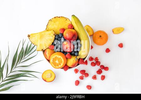 Tropical fruits on a white background top view. Stock Photo