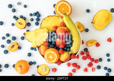 Tropical fruits on a white background top view. Stock Photo