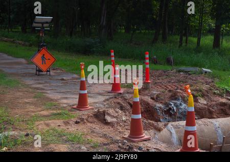 The under-construction sign in the public park Stock Photo