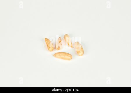Wild Uzbek papershell almonds 'kaymak' on a white background Stock Photo