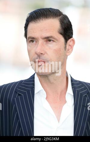 Cannes, Frankreich. 21st May, 2022. Melvil Poupaud poses at the photocall of 'Brother and Sister' during the 75th Annual Cannes Film Festival at Palais des Festivals in Cannes, France, on 21 May 2022. Credit: dpa/Alamy Live News Stock Photo