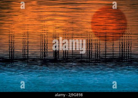 Sunset abstract, with reflections, water. Stock Photo
