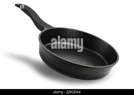 black frying pan with a non-stick coating isolated on white background with clipping path and full depth of field Stock Photo