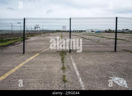 Overlooking the disused former port ferry parking area at Stranraer.....seen from the station parking area Stock Photo