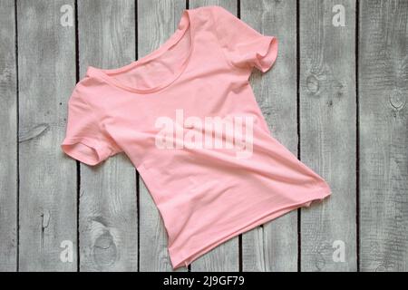 Pink T-shirt template, isolated on background. Men's realistic T-shirt  mockup 3d render Stock Photo - Alamy