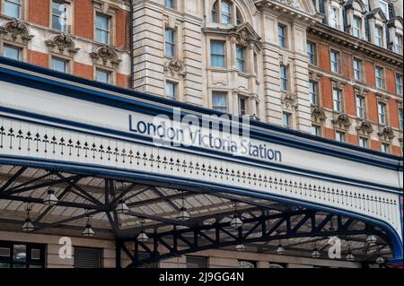 London, UK- May 3, 2022: The entrance and sign for London Victoria Station Stock Photo