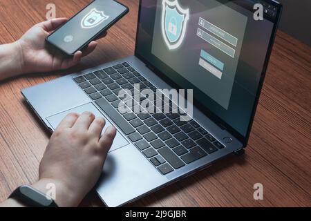 Woman use laptop to logging in personal user information. Security information and encryption. Cyber security concept. Secure internet access. Stock Photo
