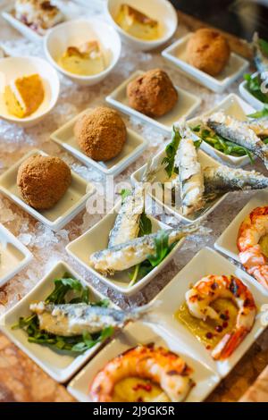 Venetian cicchetti polpette, Sarde in Saor and shrimps with polenta