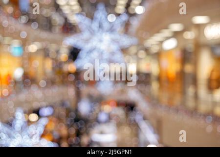 Bright blurred bokeh background from Christmas decor. Optical effect Stock Photo