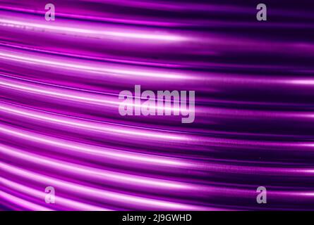 Shiny copper pipes, abstract artistic background. Stock Photo
