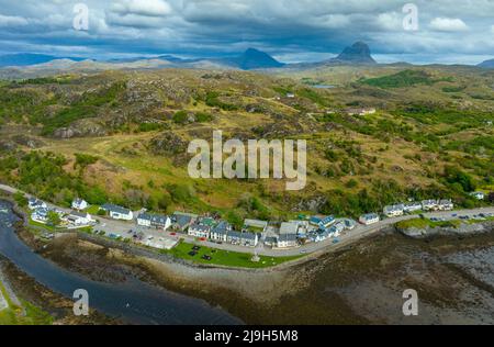 Aerial view from drone of village of Lochinver on North Coast 500 route in Assynt, Sutherland, Highland, Scotland Stock Photo