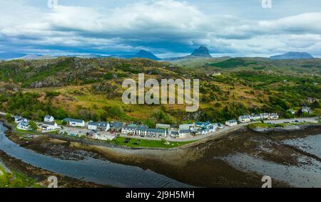 Aerial view from drone of village of Lochinver on North Coast 500 route in Assynt, Sutherland, Highland, Scotland Stock Photo