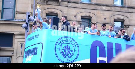 Manchester, UK, 23rd May, 2022. Fernando Luiz Roza, known as Fernandinho, captain of the club, holds the cup. Manchester City Football Club holds a victory parade to celebrate the club's Premier League title win after beating Aston Villa at the Etihad Stadium on 22nd May. The parade of open top buses went through central Manchester, England, United Kingdom. The club said: 'The club will celebrate its victory with fans with an open-top bus parade in Manchester city centre on Monday 23rd May, concluding with a stage show at Deansgate (Beetham Tower).' Credit: Terry Waller/Alamy Live News Stock Photo