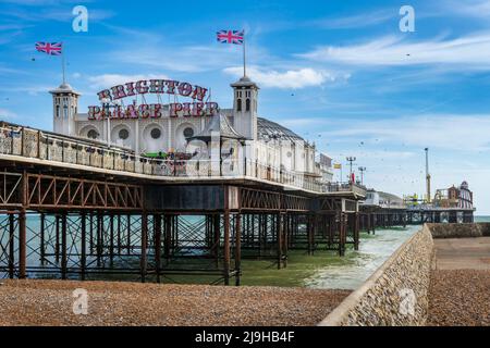 The Brighton Palace Pier, also known as Brighton Pier or Palace Pier, is a Grade II listed pleasure pier in Brighton and is the only one of three pier Stock Photo